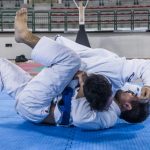 Two Brazilian Jiu-Jitsu athletes competing