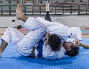 Two Brazilian Jiu-Jitsu athletes competing