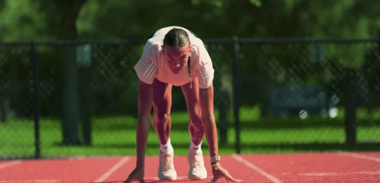 Anna Hall on track starting line.