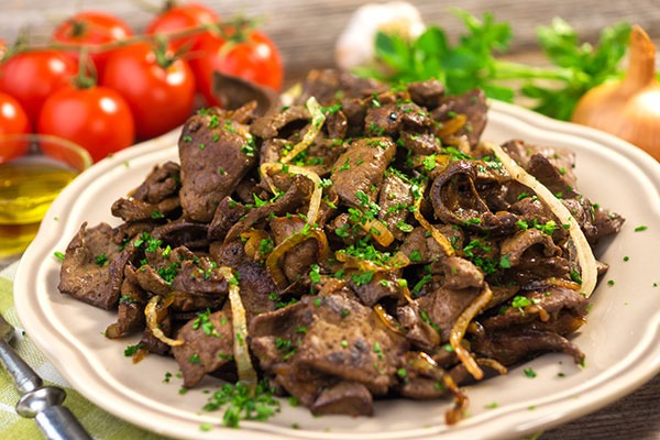 cooked liver and onions on a plate