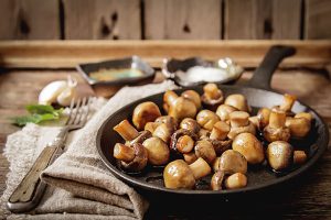 Cooked mushrooms in a pan.