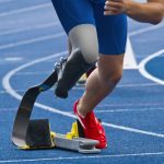 track and field runner with prosthetic leg
