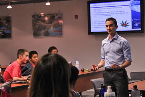 A USADA educator presenting anti-doping information to athletes.