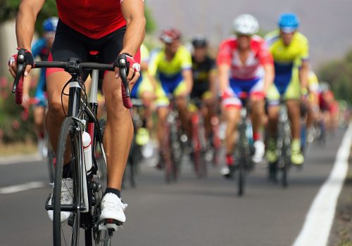 A group of road cyclists.