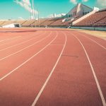 An empty track and stadium.