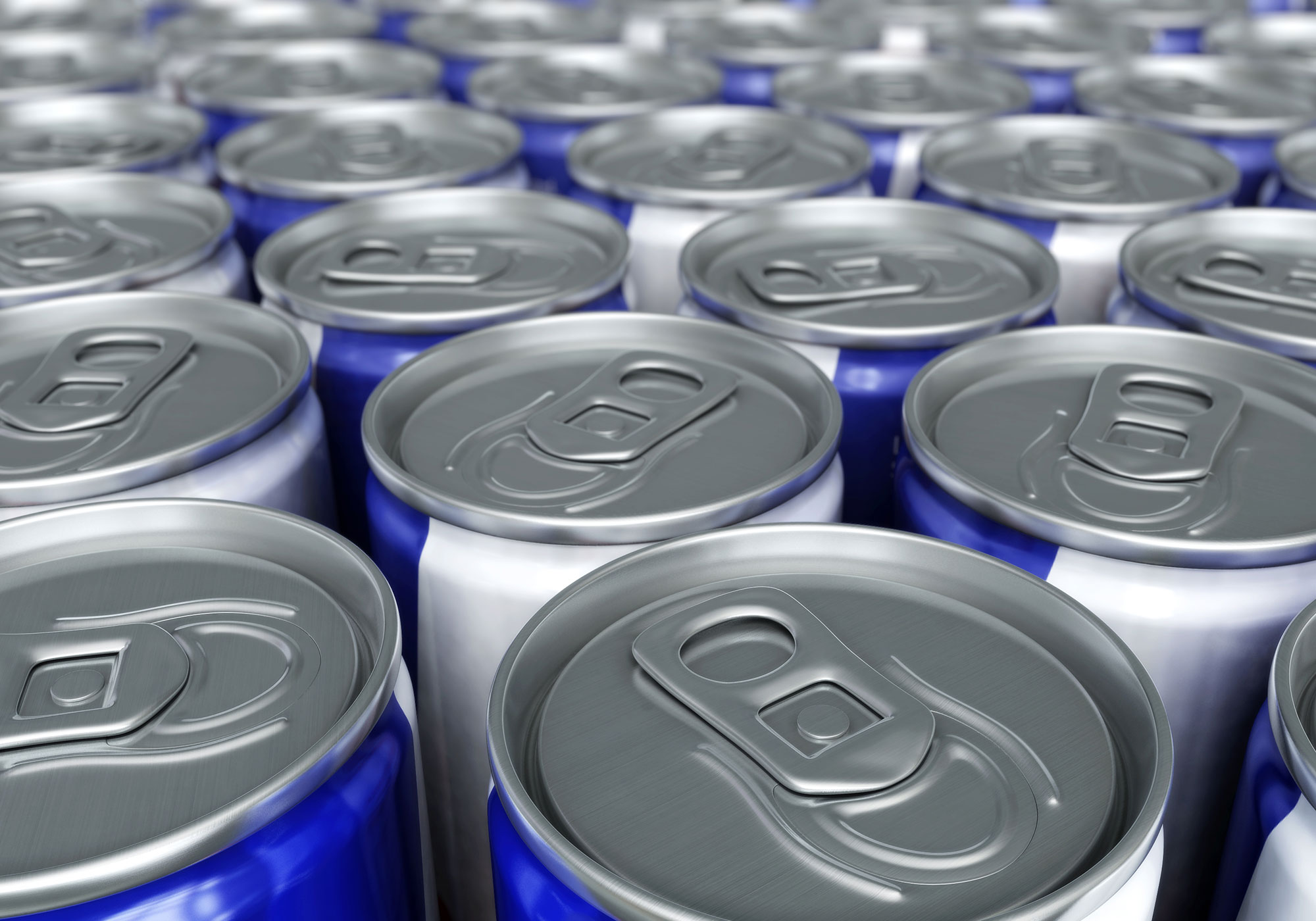 overhead shot of many cans of energy drinks