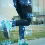 Closeup of runners legs with overlay of technical screens.