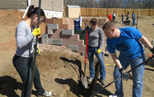 Staff from USADA helping to build homes for Habitat for Humanity.