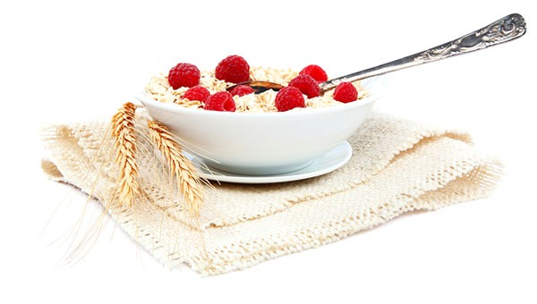 Bowl of oatmeal with raspberries