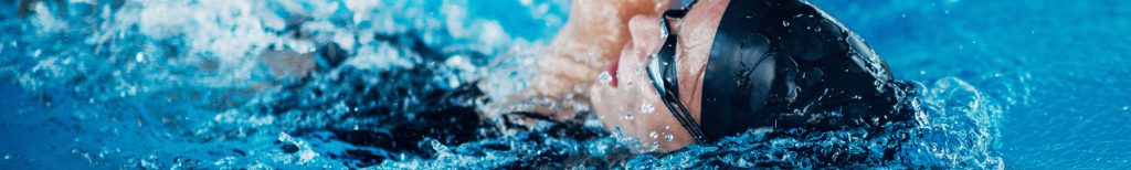 Close up of a swimmer in water.