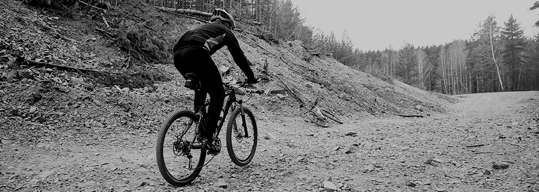 mountain-biker-on-trail-black-and-white