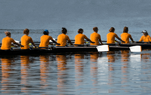 a rowing team training on the water