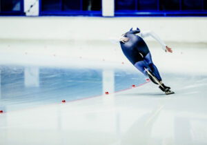 Speedskater going around corner.