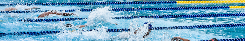 athletes swimming race