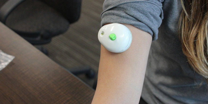 tap device on women's arm