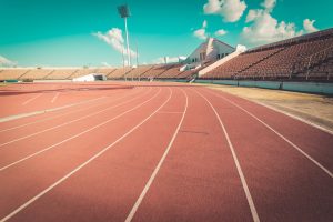 An empty track on a blue sky day.