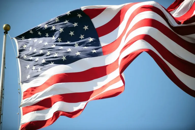 Flag of the United States of American blowing in the wind.